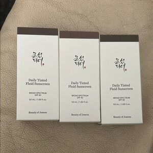 Daily Tinted Fluid Sunscreen - Brown and Cream